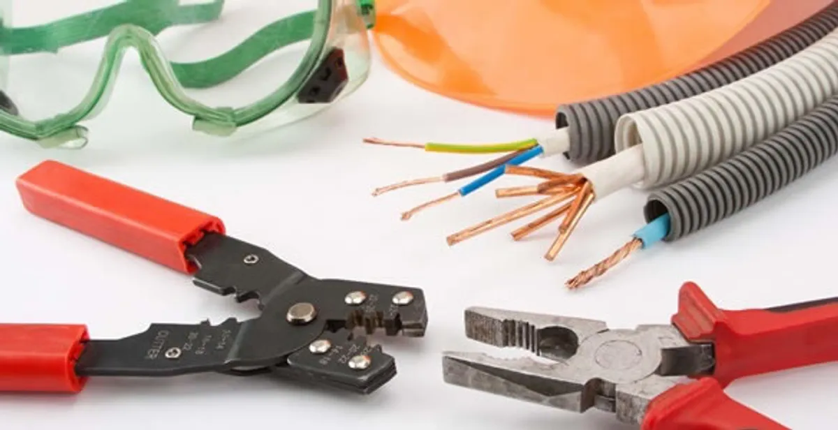 Electrical wiring repair with professional tools and safety equipment in Hallandale, FL