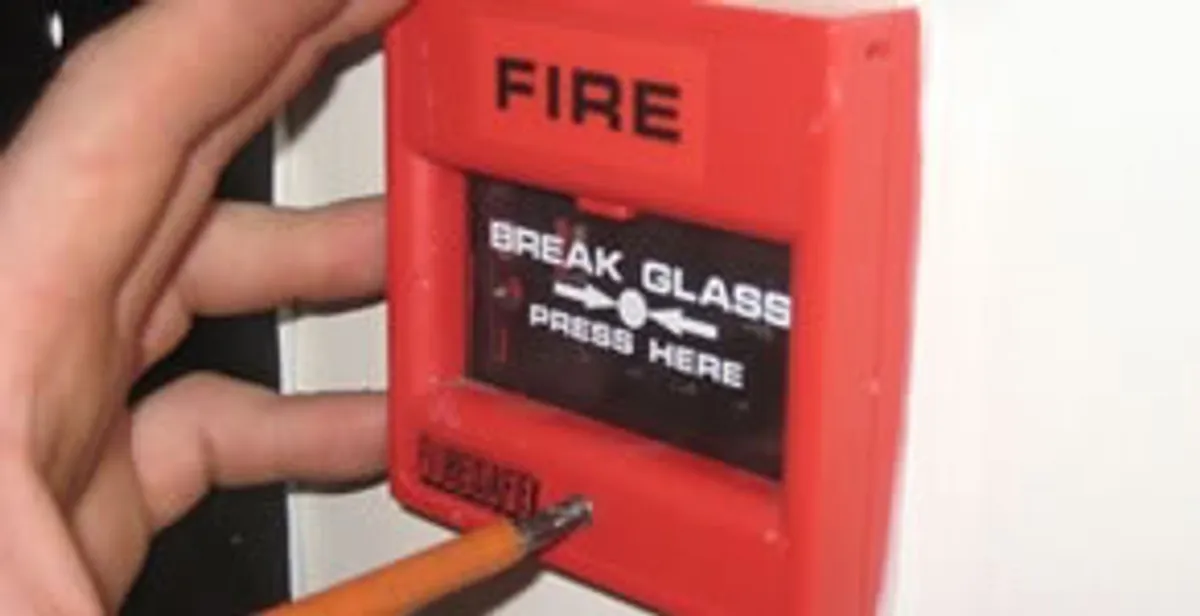 fire alarm installation service showing manual fire alarm pull station installed by licensed electricians in Miami, FL