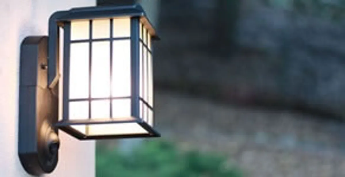 security light installation services with professionally mounted exterior wall light in Miami, FL